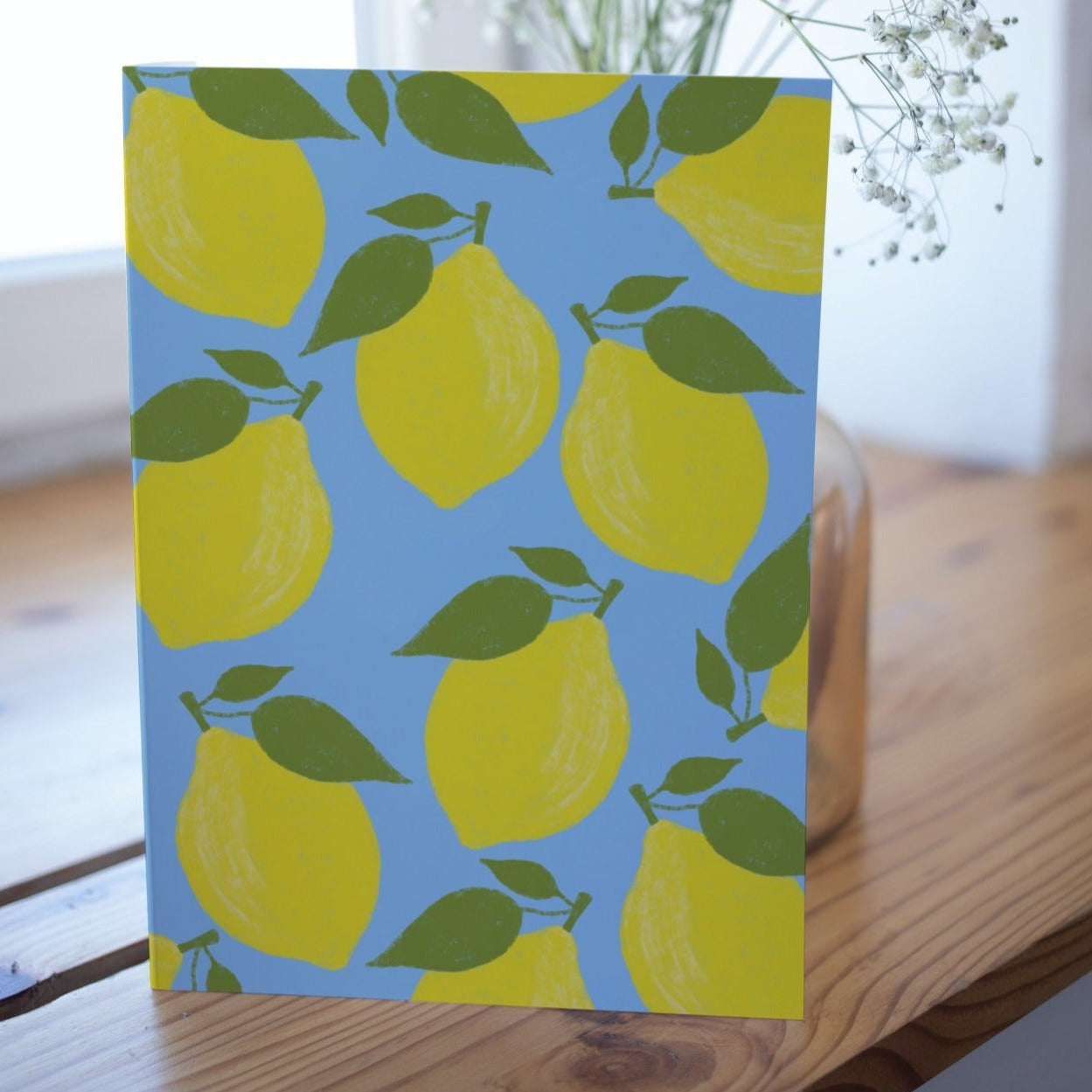 Lemons on blue Greetings Card